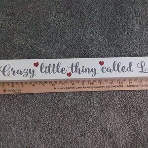 Crazy little thing called love sign